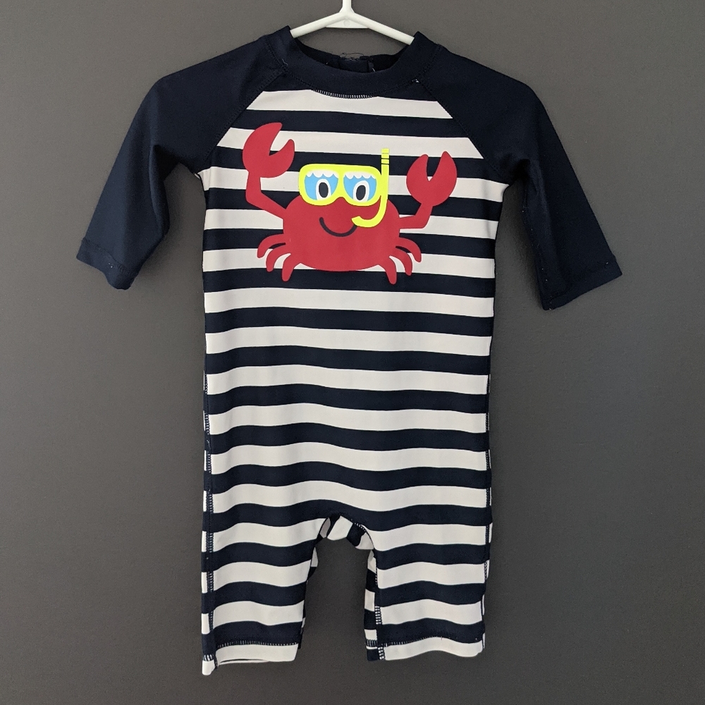 Navy blue and white striped crab print rash guard